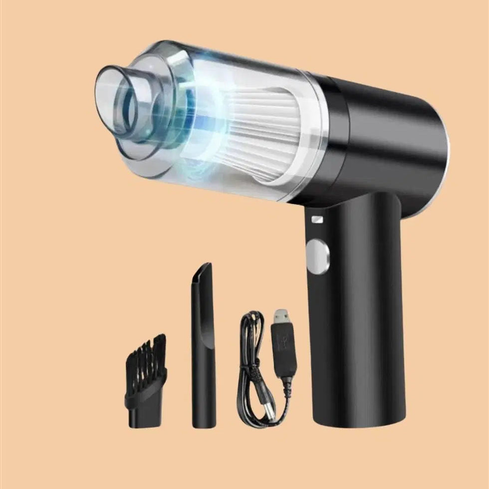 Black handheld vacuum cleaner with attachments on a beige background